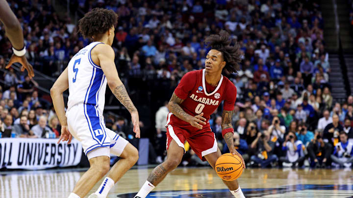 Mar 29, 2025; Newark, NJ, USA; Alabama Crimson Tide guard Labaron Philon (0) handles the ball against Duke Blue Devils guard Tyrese Proctor (5) during the second half in the East Regional final of the 2025 NCAA tournament at Prudential Center. Mandatory Credit: Vincent Carchietta-Imagn Images Mar 29, 2025; Newark, NJ, USA; Alabama Crimson Tide guard Labaron Philon (0) handles the ball against Duke Blue Devils guard Tyrese Proctor (5) during the second half in the East Regional final of the 2025 NCAA tournament at Prudential Center. Mandatory Credit: Vincent Carchietta-Imagn Images