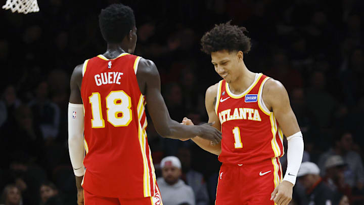 Feb 3, 2026; Miami, Florida, USA; Atlanta Hawks forward Mouhamed Gueye (18) and forward Jalen Johnson (1) react against the Miami Heat during the second half at Kaseya Center. Mandatory Credit: Rhona Wise-Imagn Images Feb 3, 2026; Miami, Florida, USA; Atlanta Hawks forward Mouhamed Gueye (18) and forward Jalen Johnson (1) react against the Miami Heat during the second half at Kaseya Center. Mandatory Credit: Rhona Wise-Imagn Images