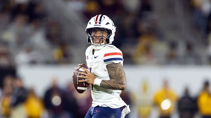 Nov 28, 2025; Tempe, Arizona, USA; Arizona Wildcats quarterback Noah Fifita (1) against the Arizona State Sun Devils during the 99th Territorial Cup at Mountain America Stadium. Mandatory Credit: Mark J. Rebilas-Imagn Images Nov 28, 2025; Tempe, Arizona, USA; Arizona Wildcats quarterback Noah Fifita (1) against the Arizona State Sun Devils during the 99th Territorial Cup at Mountain America Stadium. Mandatory Credit: Mark J. Rebilas-Imagn Images