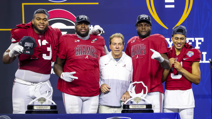 Dec 31, 2021; Arlington, Texas, USA; Alabama Crimson Tide players and head coach Nick Saban  celebrate after winning the game against the Cincinnati Bearcats in the 2021 Cotton Bowl college football CFP national semifinal game at AT&T Stadium. Mandatory Credit: Kevin Jairaj-USA TODAY Sports