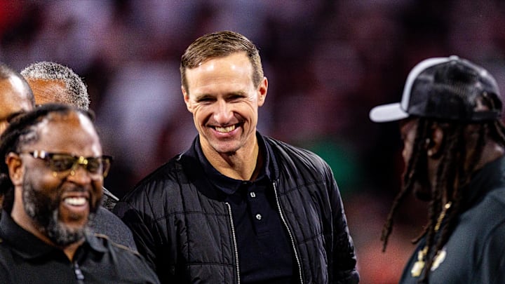 Nov 17, 2024; New Orleans, Louisiana, USA;  Former New Orleans Saints quarterback Drew Brees during the half time Ring of Honor ceremony for Jahri Evans at Caesars Superdome. Mandatory Credit: Stephen Lew-Imagn Images