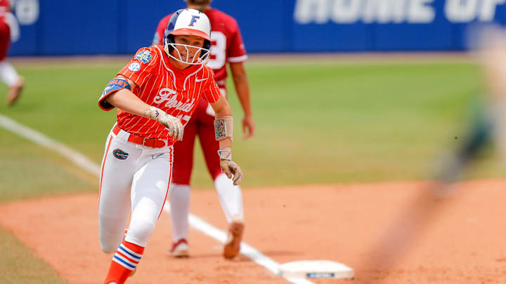 Florida outfielder Kendra Falby (27) round third to take home for a run int eh second inning during a Women’s College World Series semifinal game between Oklahoma (OU) and Florida at Devon Park in Oklahoma City, on Monday, June 3, 2024.