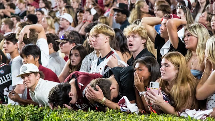 Oct 25, 2025; Columbia, South Carolina, USA; South Carolina Gamecocks students react to a Gamecocks fumble against the Alabama Crimson Tide in the fourth quarter at Williams-Brice Stadium. Mandatory Credit: Jeff Blake-Imagn Images Oct 25, 2025; Columbia, South Carolina, USA; South Carolina Gamecocks students react to a Gamecocks fumble against the Alabama Crimson Tide in the fourth quarter at Williams-Brice Stadium. Mandatory Credit: Jeff Blake-Imagn Images