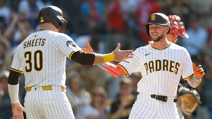 Jul 12, 2025; San Diego, California, USA; San Diego Padres center fielder Jackson Merrill (3) celebrates with left fielder Gavin Sheets (30) after hitting a two-run home run during the second inning against the Philadelphia Phillies at Petco Park. Mandatory Credit: David Frerker-Imagn Images Jul 12, 2025; San Diego, California, USA; San Diego Padres center fielder Jackson Merrill (3) celebrates with left fielder Gavin Sheets (30) after hitting a two-run home run during the second inning against the Philadelphia Phillies at Petco Park. Mandatory Credit: David Frerker-Imagn Images