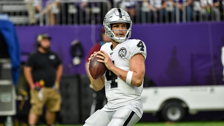 Sep 22, 2019; Minneapolis, MN, USA; Oakland Raiders quarterback Derek Carr (4) in action against the Minnesota Vikings at U.S. Bank Stadium. Mandatory Credit: Jeffrey Becker-Imagn Images
