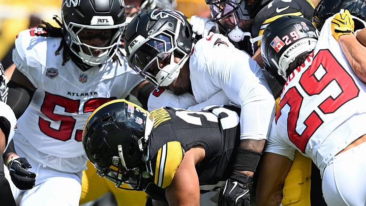 Atlanta Falcons defensive tackle Gervon Dexter Sr. tackles Pittsburgh Steelers running back Jaylen Warren (30) during the first quarter at Acrisure Stadium. Mandatory Credit: Barry Reeger-Imagn Images
