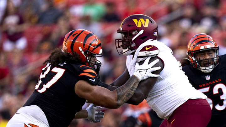 Aug 26, 2023; Landover, Maryland, USA;  Cincinnati Bengals defensive tackle Jay Tufele (97) blocks