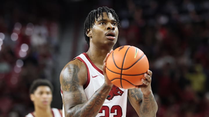 Jan 14, 2026; Fayetteville, Arkansas, USA; Arkansas Razorbacks forward Nick Pringle (23) shoots a free throw during the first half against the South Carolina Gamecocks at Bud Walton Arena. Mandatory Credit: Nelson Chenault-Imagn Images