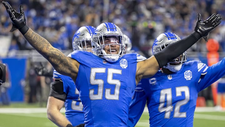 Detroit Lions linebacker Derrick Barnes (55) celebrates after making an interception