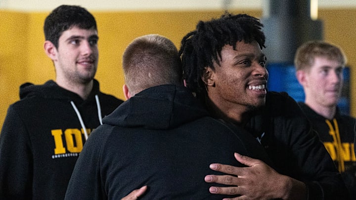 Iowa’s Tavion Banks hugs Iowa guard Bennett Stirtz after the Iowa Hawkeyes’ are announced as a 9-seed in the NCAA Tournament March 15, 2026 at Carver-Hawkeye Arena in Iowa City, Iowa. Iowa’s Tavion Banks hugs Iowa guard Bennett Stirtz after the Iowa Hawkeyes’ are announced as a 9-seed in the NCAA Tournament March 15, 2026 at Carver-Hawkeye Arena in Iowa City, Iowa.