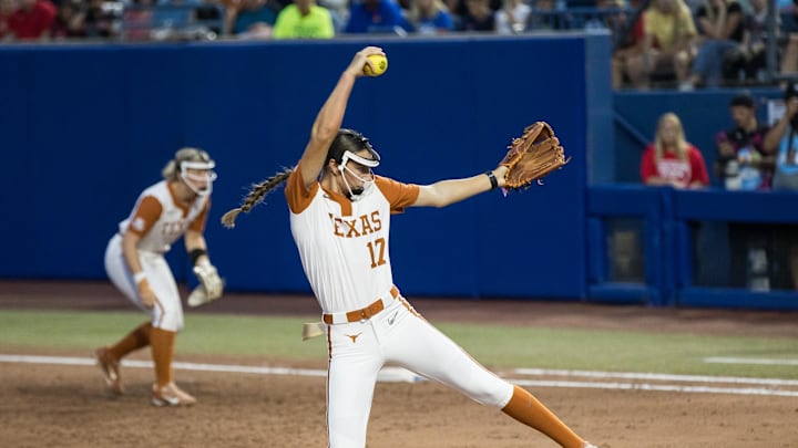 Jun 4, 2025; Oklahoma City, OK, USA; Texas Longhorns pitcher Teagan Kavan (17) throws a pitch in the sixth inning against the Texas Tech Red Raiders during game one of the NCAA Softball Women's College World Series finals at Devon Park. Mandatory Credit: Brett Rojo-Imagn Images Jun 4, 2025; Oklahoma City, OK, USA; Texas Longhorns pitcher Teagan Kavan (17) throws a pitch in the sixth inning against the Texas Tech Red Raiders during game one of the NCAA Softball Women's College World Series finals at Devon Park. Mandatory Credit: Brett Rojo-Imagn Images