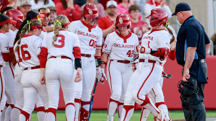 Oklahoma catcher Kendall Wells (1) hits a home run during the home opener softball game between Oklahoma and Alabama State at Love’s Field in Norman Okla., on Thursday, Feb. 26, 2026.