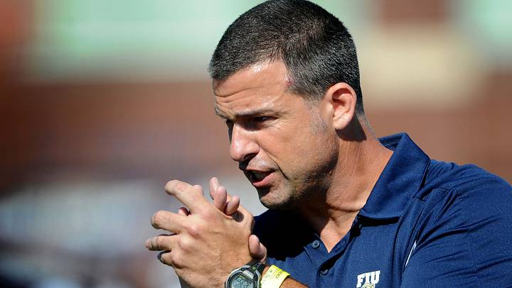 October 8, 2011; Akron, OH , USA; FIU Golden Panthers head coach Mario Cristobal before the game against the Akron Zips at  InfoCision Stadium. Mandatory Credit: Eric P. Mull-Imagn Images