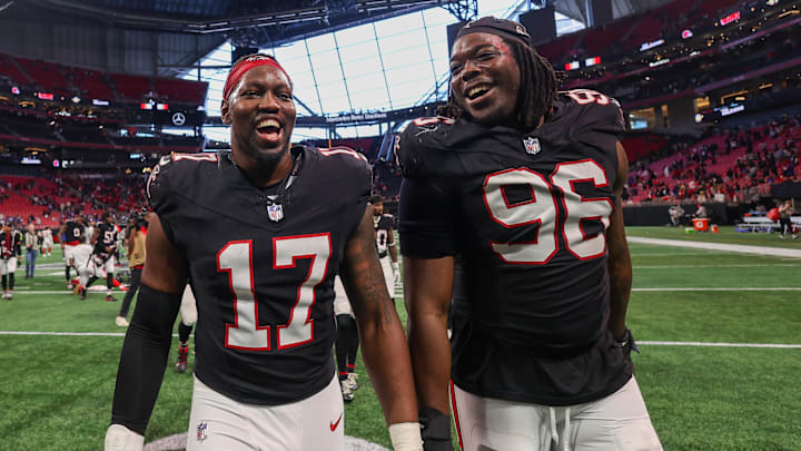 Dec 22, 2024; Atlanta, Georgia, USA; Atlanta Falcons linebacker Arnold Ebiketie (17) and defensive end Zach Harrison (96) celebrate after a victory over the New York Giants at Mercedes-Benz Stadium. Mandatory Credit: Brett Davis-Imagn Images
