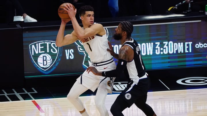 May 1, 2021; Los Angeles, California, USA; Denver Nuggets forward Michael Porter Jr. (1) controls the ball against Los Angeles Clippers guard Paul George (13) during the first half at Staples Center. Mandatory Credit: Gary A. Vasquez-USA TODAY Sports May 1, 2021; Los Angeles, California, USA; Denver Nuggets forward Michael Porter Jr. (1) controls the ball against Los Angeles Clippers guard Paul George (13) during the first half at Staples Center. Mandatory Credit: Gary A. Vasquez-USA TODAY Sports