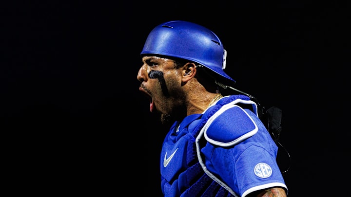 Jun 2, 2024; Lexington, KY, USA; Kentucky Wildcats catcher Devin Burkes (7) celebrates a strikeout during the sixth inning against the Indiana State Sycamores at Kentucky Proud Park. Mandatory Credit: Jordan Prather-Imagn Images
