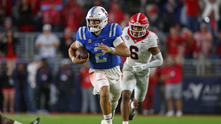 Nov 9, 2024; Oxford, Mississippi, USA; Mississippi Rebels quarterback Jaxson Dart (2) runs the ball during the second half  against the Georgia Bulldogs at Vaught-Hemingway Stadium. Mandatory Credit: Petre Thomas-Imagn Images