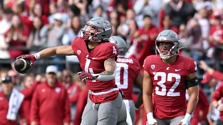 Oct 19, 2024; Pullman, Washington, USA; Washington State Cougars defensive back Kapena Gushiken (4) celebrates after recovering a fumble by the Hawaii Warriors in the first half at Gesa Field at Martin Stadium. Mandatory Credit: James Snook-Imagn Images Oct 19, 2024; Pullman, Washington, USA; Washington State Cougars defensive back Kapena Gushiken (4) celebrates after recovering a fumble by the Hawaii Warriors in the first half at Gesa Field at Martin Stadium. Mandatory Credit: James Snook-Imagn Images
