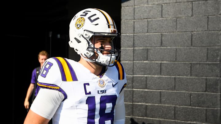 Oct 18, 2025; Nashville, Tennessee, USA;  Louisiana State Tigers quarterback Garrett Nussmeier (18) against the Vanderbilt Commodores during pre-game warmups at FirstBank Stadium. Mandatory Credit: Steve Roberts-Imagn Images