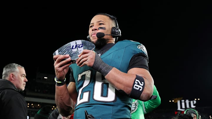 Jan 26, 2025; Philadelphia, PA, USA; Philadelphia Eagles running back Saquon Barkley (26) celebrates after winning the NFC Championship game against the Washington Commanders at Lincoln Financial Field.  