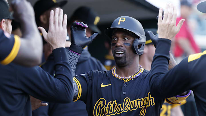 Jun 19, 2025; Detroit, Michigan, USA;  Pittsburgh Pirates outfielder Andrew McCutchen (22) receives congratulations from teammates after he hits a home run in the third inning against the Detroit Tigers at Comerica Park. Mandatory Credit: Rick Osentoski-Imagn Images