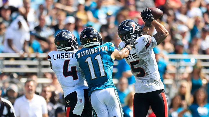 Houston Texans safety Jalen Pitre (5) collects an interception during the fourth quarter of an NFL football matchup at EverBank Stadium, Sunday, Sept. 21, 2025, in Jacksonville, Fla. The Jaguars defeated the Texans 17-10. Houston Texans safety Jalen Pitre (5) collects an interception during the fourth quarter of an NFL football matchup at EverBank Stadium, Sunday, Sept. 21, 2025, in Jacksonville, Fla. The Jaguars defeated the Texans 17-10.