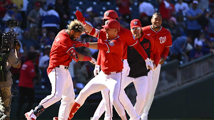 Apr 27, 2025; Washington, District of Columbia, USA; Washington Nationals second baseman Luis Garcia Jr. (2) is congratulated by teammates after the game against the New York Mets at Nationals Park. Mandatory Credit: Brad Mills-Imagn Images Apr 27, 2025; Washington, District of Columbia, USA; Washington Nationals second baseman Luis Garcia Jr. (2) is congratulated by teammates after the game against the New York Mets at Nationals Park. Mandatory Credit: Brad Mills-Imagn Images
