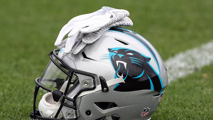 Jul 27, 2017; Spartanburg, SC, USA; Carolina Panthers logo helmet and gloves wait on the turf during Panthers Training Camp at Wofford College. Mandatory Credit: Jim Dedmon-USA TODAY Sports Jul 27, 2017; Spartanburg, SC, USA; Carolina Panthers logo helmet and gloves wait on the turf during Panthers Training Camp at Wofford College. Mandatory Credit: Jim Dedmon-USA TODAY Sports