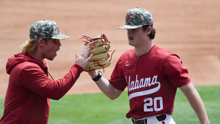 Apr 14, 2024; Tuscaloosa, AL, USA; Alabama pitcher Zane Adams (20) is congratulated after a shutout