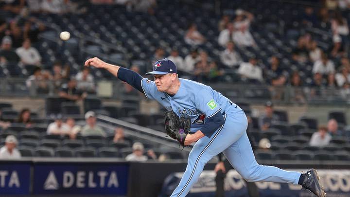 May 20, 2026; Bronx, New York, USA; Toronto Blue Jays pitcher Louis Varland (77) delivers a pitch during the ninth inning against the New York Yankees at Yankee Stadium. Mandatory Credit: Vincent Carchietta-Imagn Images