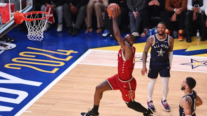 Feb 18, 2024; Indianapolis, Indiana, USA; Western Conference forward LeBron James (23) of the Los Angeles Lakers dunks the ball against the Eastern Conference All-Stars during the first quarter in the 73rd NBA All Star game at Gainbridge Fieldhouse. Mandatory Credit: Trevor Ruszkowski-Imagn Images Feb 18, 2024; Indianapolis, Indiana, USA; Western Conference forward LeBron James (23) of the Los Angeles Lakers dunks the ball against the Eastern Conference All-Stars during the first quarter in the 73rd NBA All Star game at Gainbridge Fieldhouse. Mandatory Credit: Trevor Ruszkowski-Imagn Images