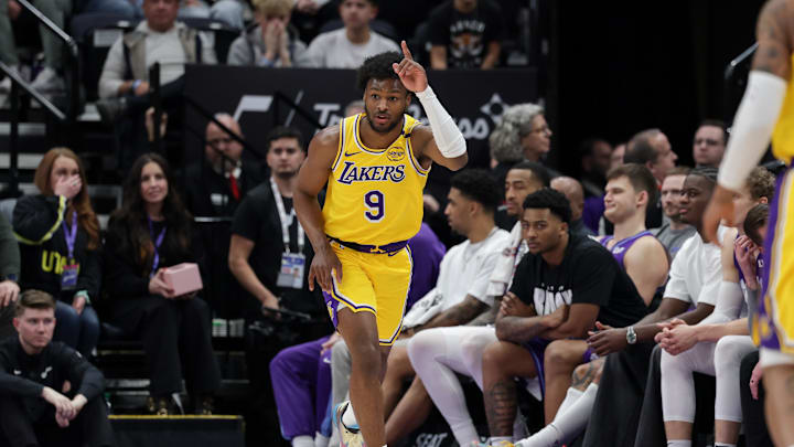 Feb 12, 2025; Salt Lake City, Utah, USA; Los Angeles Lakers guard Bronny James (9) celebrates after making a three point basket during the second half against the Utah Jazz at Delta Center. Mandatory Credit: Chris Nicoll-Imagn Images Feb 12, 2025; Salt Lake City, Utah, USA; Los Angeles Lakers guard Bronny James (9) celebrates after making a three point basket during the second half against the Utah Jazz at Delta Center. Mandatory Credit: Chris Nicoll-Imagn Images