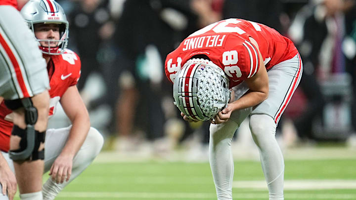 Ohio State Buckeyes kicker Jayden Fielding (38) reacts following a missed field goal during the Big Ten Conference championship game against the Indiana Hoosiers at Lucas Oil Stadium in Indianapolis on Dec. 6, 2025. Ohio State lost 13-10.