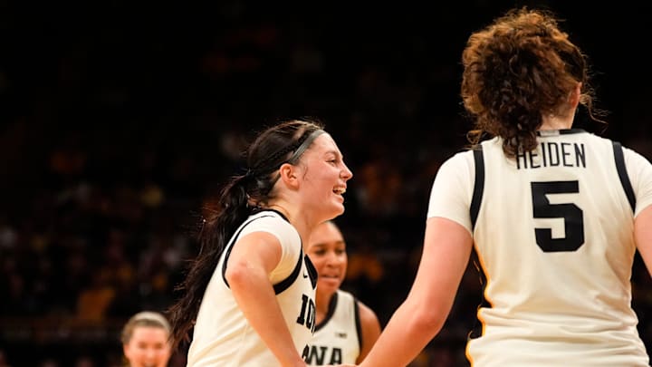 Iowa guard Taylor McCabe (2) high-fives Iowa center Ava Heiden (5) Nov. 3, 2025 during a women’s college basketball game against the Southern Jaguars at Carver-Hawkeye Arena in Iowa City, Iowa. Iowa guard Taylor McCabe (2) high-fives Iowa center Ava Heiden (5) Nov. 3, 2025 during a women’s college basketball game against the Southern Jaguars at Carver-Hawkeye Arena in Iowa City, Iowa.