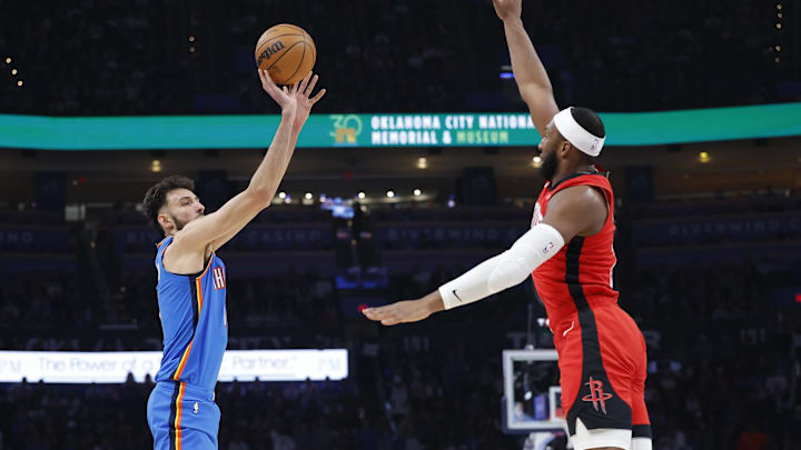 Oct 21, 2025; Oklahoma City, Oklahoma, USA; Oklahoma City Thunder center Chet Holmgren (7) shoots against the Houston Rockets during the first half at Paycom Center. Mandatory Credit: Alonzo Adams-Imagn Images