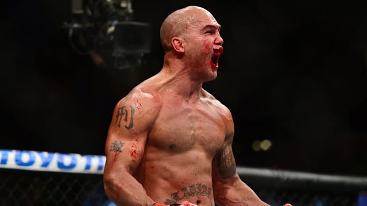 Jul 11, 2015; Las Vegas, NV, USA; Robbie Lawler (red gloves) and Rory MacDonald (not pictured) fight