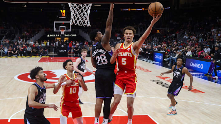 Apr 6, 2025; Atlanta, Georgia, USA; Atlanta Hawks guard Dyson Daniels (5) shoots past Utah Jazz forward Brice Sensabaugh (28) in the first half at State Farm Arena. Mandatory Credit: Brett Davis-Imagn Images Apr 6, 2025; Atlanta, Georgia, USA; Atlanta Hawks guard Dyson Daniels (5) shoots past Utah Jazz forward Brice Sensabaugh (28) in the first half at State Farm Arena. Mandatory Credit: Brett Davis-Imagn Images