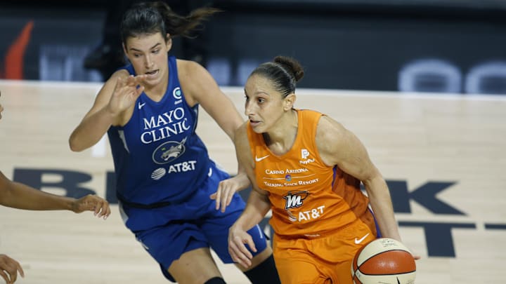 Sep 17, 2020; Palmetto, Florida, USA; Phoenix Mercury guard Diana Taurasi (right) drives around Minnesota Lynx guard Bridget Carleton (left) during the second half at the FELD entertainment complex. Mandatory Credit: Reinhold Matay-Imagn Images 