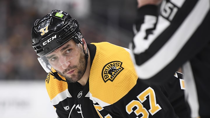 Apr 26, 2023; Boston, Massachusetts, USA; Boston Bruins center Patrice Bergeron (37) gets ready for a face-off during the first period in game five of the first round of the 2023 Stanley Cup Playoffs against the Florida Panthers at TD Garden. Mandatory Credit: Bob DeChiara-Imagn Images