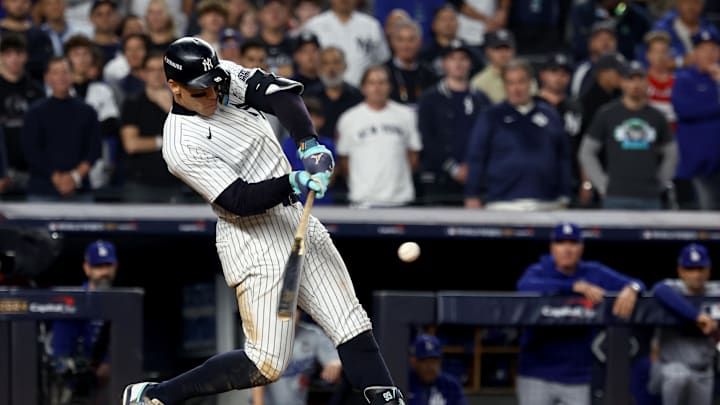 Oct 30, 2024; New York, New York, USA; New York Yankees outfielder Aaron Judge (99) doubles during the eighth inning against the Los Angeles Dodgers in game five of the 2024 MLB World Series at Yankee Stadium. Oct 30, 2024; New York, New York, USA; New York Yankees outfielder Aaron Judge (99) doubles during the eighth inning against the Los Angeles Dodgers in game five of the 2024 MLB World Series at Yankee Stadium.