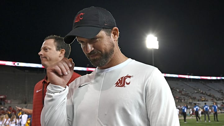 Aug 30, 2025; Pullman, Washington, USA; Washington State Cougars head coach Jimmy Rogers walks off the field after a game against the Idaho Vandals at Gesa Field at Martin Stadium. Washington State Cougars won 13-10. Mandatory Credit: James Snook-Imagn Images Aug 30, 2025; Pullman, Washington, USA; Washington State Cougars head coach Jimmy Rogers walks off the field after a game against the Idaho Vandals at Gesa Field at Martin Stadium. Washington State Cougars won 13-10. Mandatory Credit: James Snook-Imagn Images