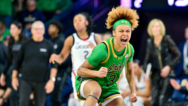 Dec 12, 2024; South Bend, Indiana, USA; Notre Dame Fighting Irish guard Hannah Hidalgo (3) celebrates after a basket in the first half against the Connecticut Huskies at the Purcell Pavilion. Mandatory Credit: Matt Cashore-Imagn Images Dec 12, 2024; South Bend, Indiana, USA; Notre Dame Fighting Irish guard Hannah Hidalgo (3) celebrates after a basket in the first half against the Connecticut Huskies at the Purcell Pavilion. Mandatory Credit: Matt Cashore-Imagn Images