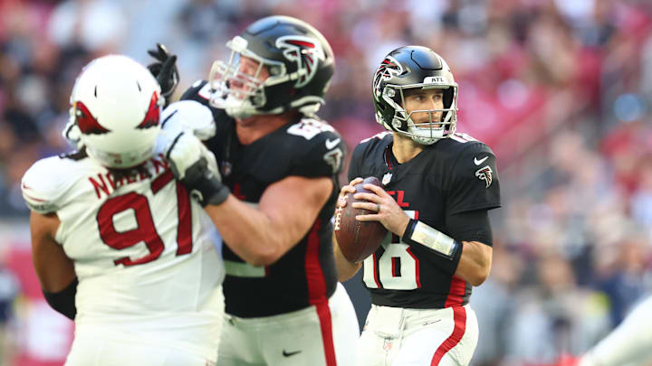 Dec 21, 2025; Glendale, Arizona, USA;  Atlanta Falcons quarterback Kirk Cousins (18) stands in the pocket against the Arizona Cardinals during the first half at State Farm Stadium. Mandatory Credit: Mark J. Rebilas-Imagn Images