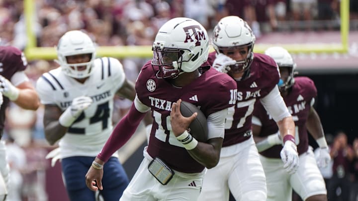 Texas A&M Aggies quarterback Marcel Reed (10) runs with the football during the first quarter against the Utah State Aggies at Kyle Field. Texas A&M Aggies quarterback Marcel Reed (10) runs with the football during the first quarter against the Utah State Aggies at Kyle Field.