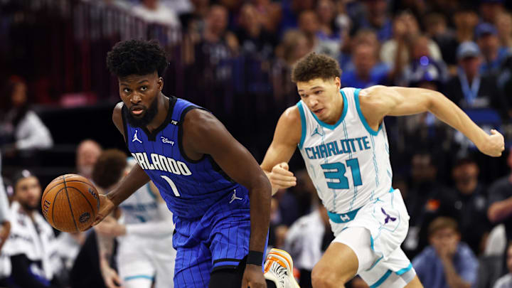Nov 12, 2024; Orlando, Florida, USA; Orlando Magic forward Jonathan Isaac (1) drives to the basket as Charlotte Hornets forward Tidjane Salaun (31) defends during the second half at Kia Center. Mandatory Credit: Kim Klement Neitzel-Imagn Images