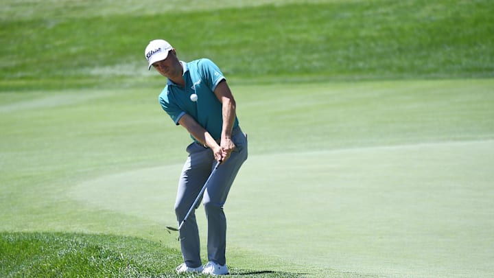 Aug 22, 2024; Castle Rock, Colorado, USA; Justin Thomas hits a chip shot on the ninth hole during the first round of the BMW Championship golf tournament at Castle Pines Golf Club. Mandatory Credit: Christopher Hanewinckel-Imagn Images Aug 22, 2024; Castle Rock, Colorado, USA; Justin Thomas hits a chip shot on the ninth hole during the first round of the BMW Championship golf tournament at Castle Pines Golf Club. Mandatory Credit: Christopher Hanewinckel-Imagn Images