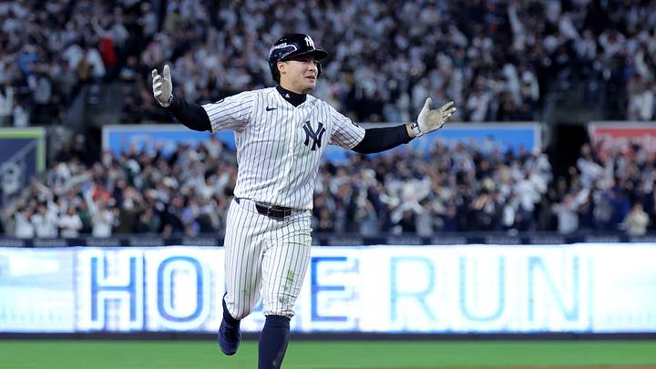 Oct 7, 2026; Bronx, New York, USA; New York Yankees second baseman Anthony Volpe (11) reacts as he rounds the bases after hitting a game-tying two run home run against the Tampa Bay Rays during the sixth inning of game three of the ALDS during the 2026 MLB Playoffs at Yankee Stadium. After review the umpires changed the call to spectator interference and Volpe was awarded an RBI double. Mandatory Credit: Brad Penner-Imagn Images