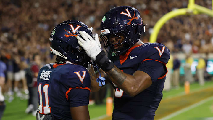 Sep 26, 2025; Charlottesville, Virginia, USA; Virginia Cavaliers wide receiver Trell Harris (11) celebrates with Cavaliers tight end Dakota Twitty (9) after catches a two point conversion as Florida State Seminoles defensive back Jerry Wilson (19) defends in the second overtime period at Scott Stadium. Mandatory Credit: Geoff Burke-Imagn Images Sep 26, 2025; Charlottesville, Virginia, USA; Virginia Cavaliers wide receiver Trell Harris (11) celebrates with Cavaliers tight end Dakota Twitty (9) after catches a two point conversion as Florida State Seminoles defensive back Jerry Wilson (19) defends in the second overtime period at Scott Stadium. Mandatory Credit: Geoff Burke-Imagn Images