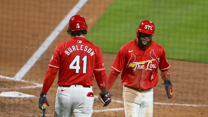 May 23, 2025; St. Louis, Missouri, USA; St. Louis Cardinals center fielder Victor Scott II (11) celebrates with first baseman Alec Burleson (41) after scoring against the Arizona Diamondbacks during the sixth inning at Busch Stadium. Mandatory Credit: Jeff Curry-Imagn Images May 23, 2025; St. Louis, Missouri, USA; St. Louis Cardinals center fielder Victor Scott II (11) celebrates with first baseman Alec Burleson (41) after scoring against the Arizona Diamondbacks during the sixth inning at Busch Stadium. Mandatory Credit: Jeff Curry-Imagn Images