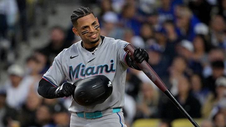 Apr 28, 2026; Los Angeles, California, USA; Miami Marlins first baseman Christopher Morel (5) smiles at the Los Angeles Dodgers bench in the first inning at Dodger Stadium. Mandatory Credit: Jayne Kamin-Oncea-Imagn Images